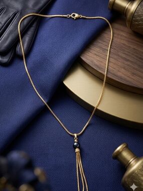 Gold Tassel Pendant Necklace with Black Pearl Accent